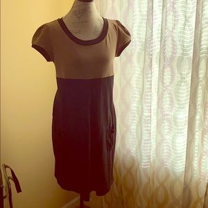 Knee length pull over 2 tone empire waist dress.